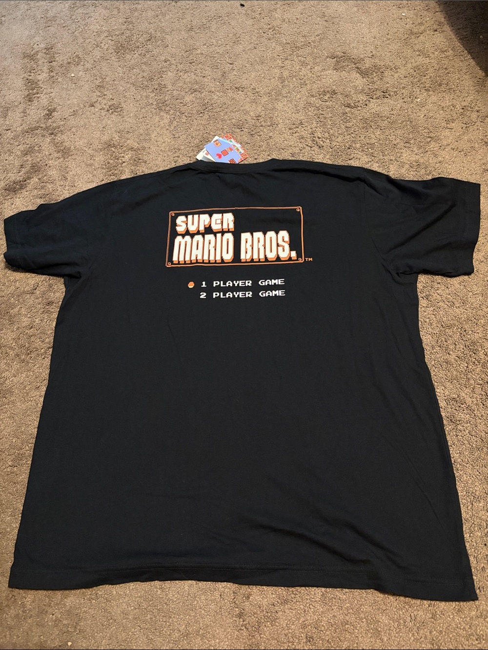 UNIQLO Nintendo Super Mario Bros. Black T-Shirt with Orange and White Logo